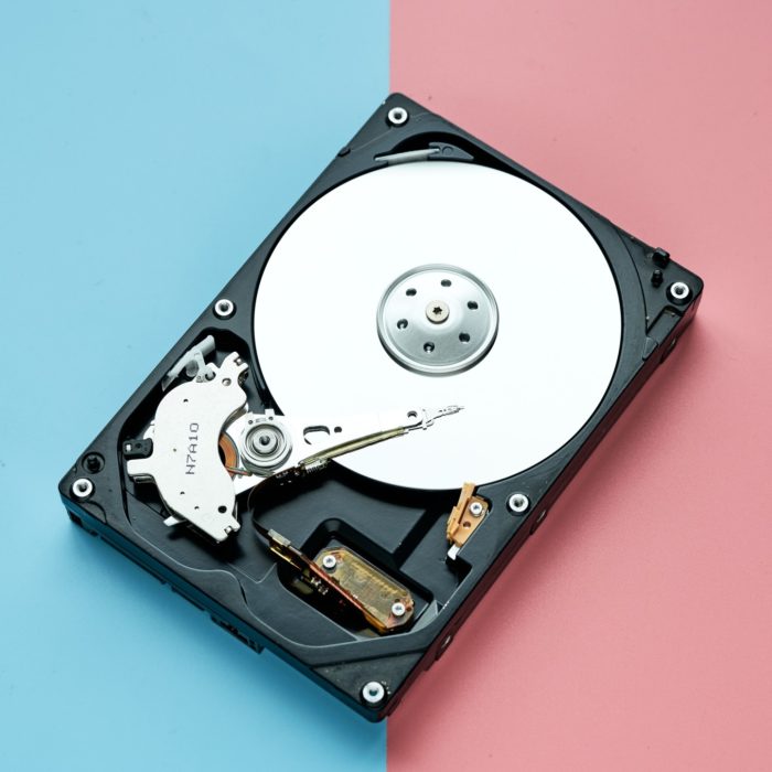 hard disk on a pink and blue background