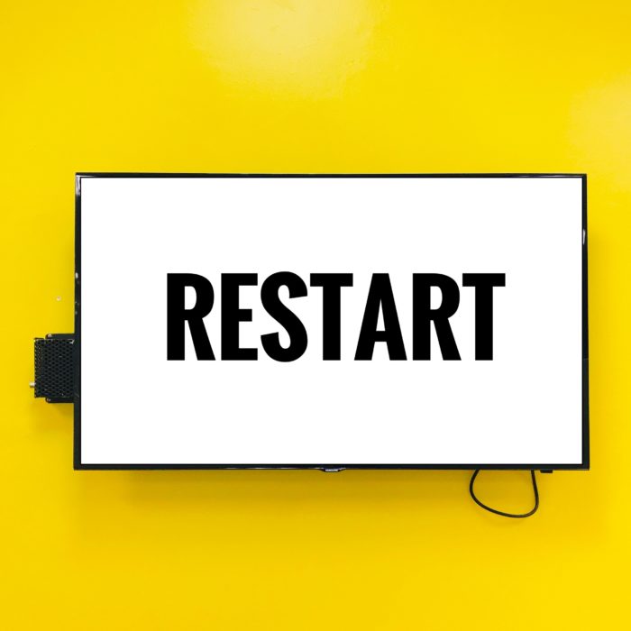 restart word on white and yellow background