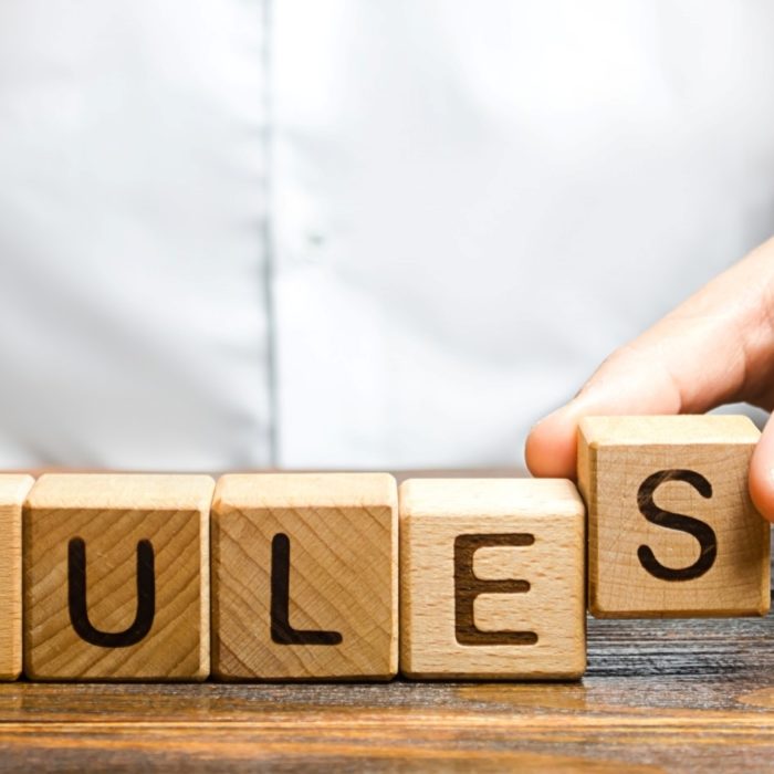 rules written on wooden blocks