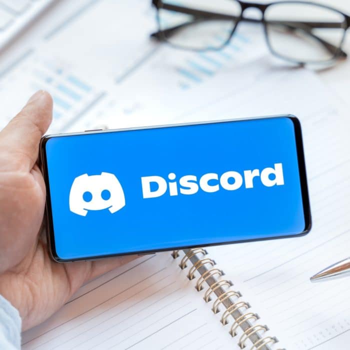 logo of Discord on phone