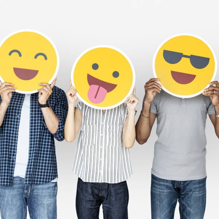 People Holding Emojis